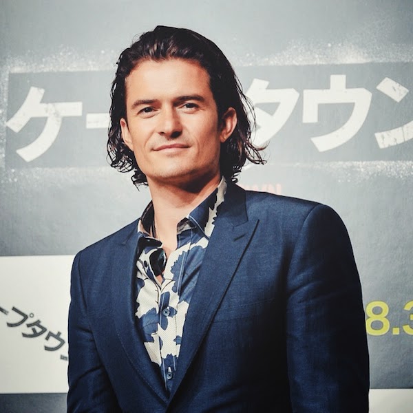 Orlando Bloom wears Burberry Prorsum Fall Winter 2014 blue floral shirt at the press conference for the Japan premiere of ZULU.jpg