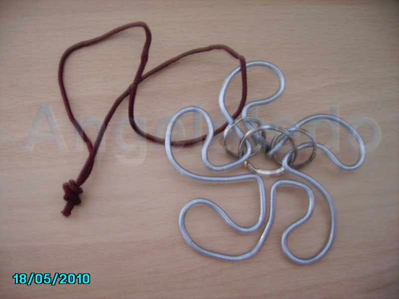 Juegos de alambre, wire puzzles Angelatedo