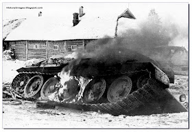 Soviet T-34 tank burns  outskirts of Moscow December 1941