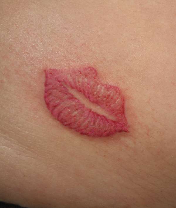 tattoo of lips. by making Lips Tattoo.