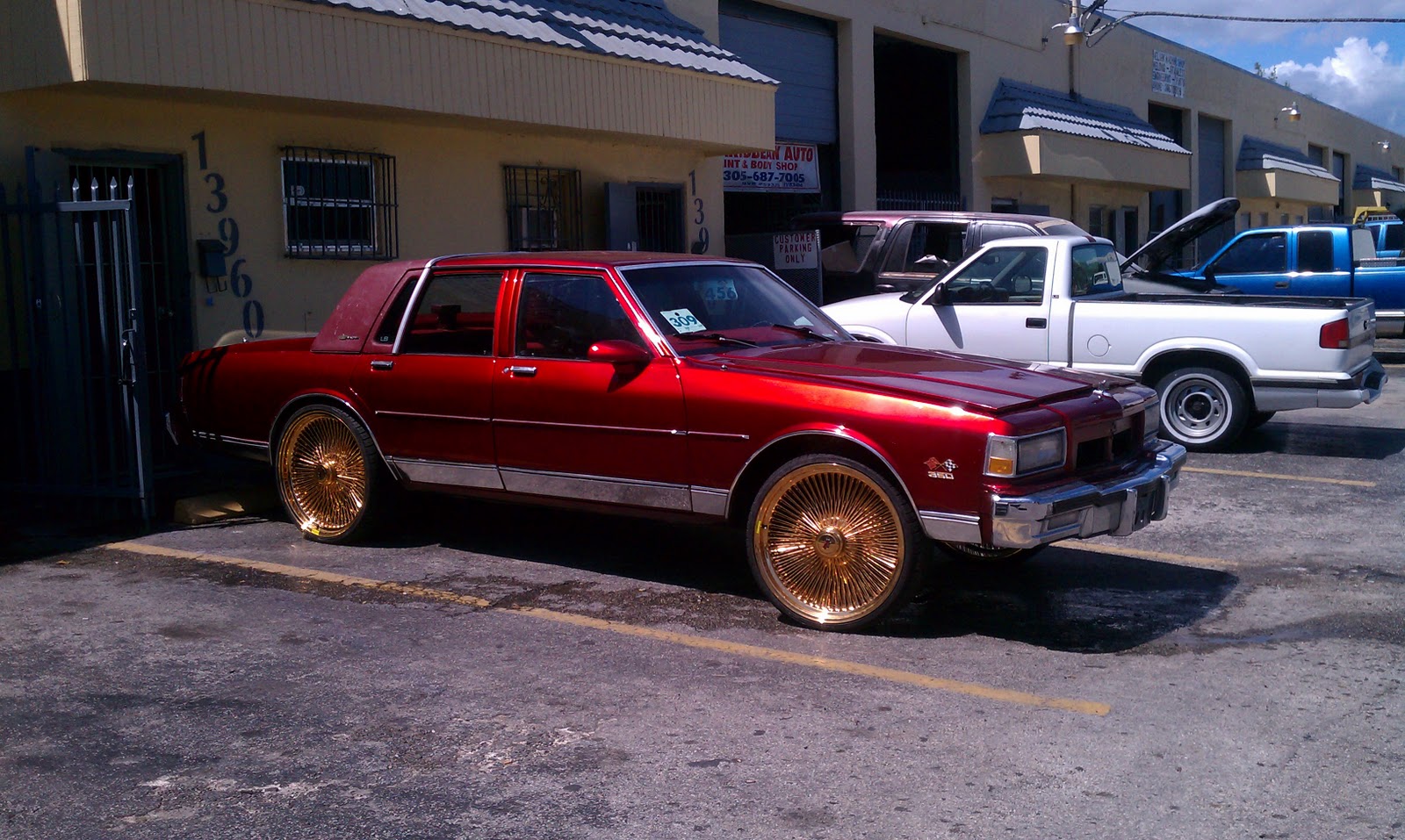 PHOTOGRAPHY BY MIAMIEARL: Box Chevy LS Brougham on 24" Gold Dayton's