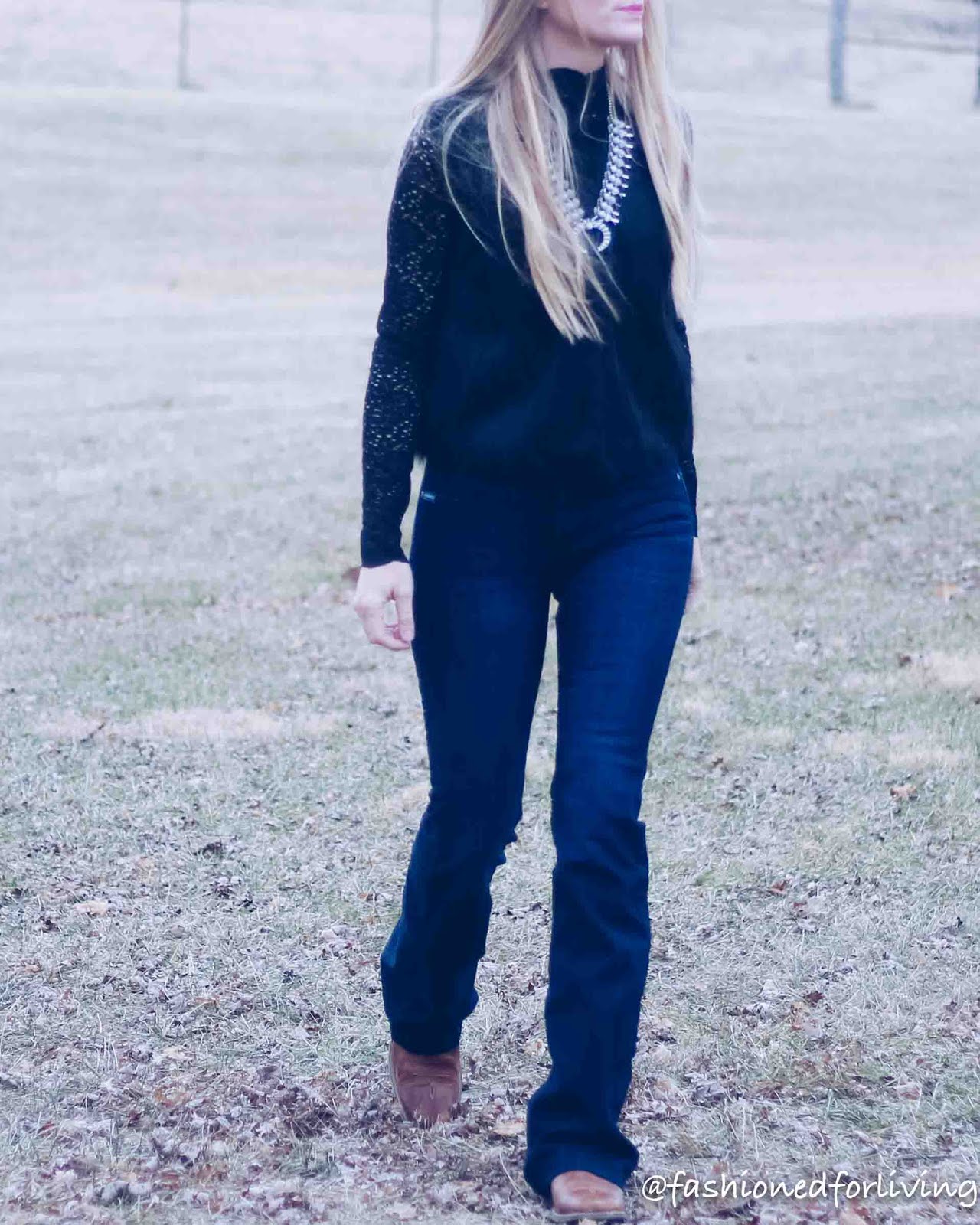 high waisted jeans outfit with cowboy boots and black turtleneck