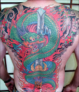 Tattooed Guy with Dragon and Sword Tattoo on Back Body