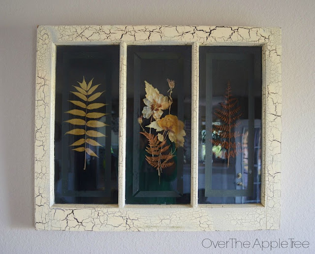 Turn a reclaimed window into a decorative frame by Over The Apple Tree