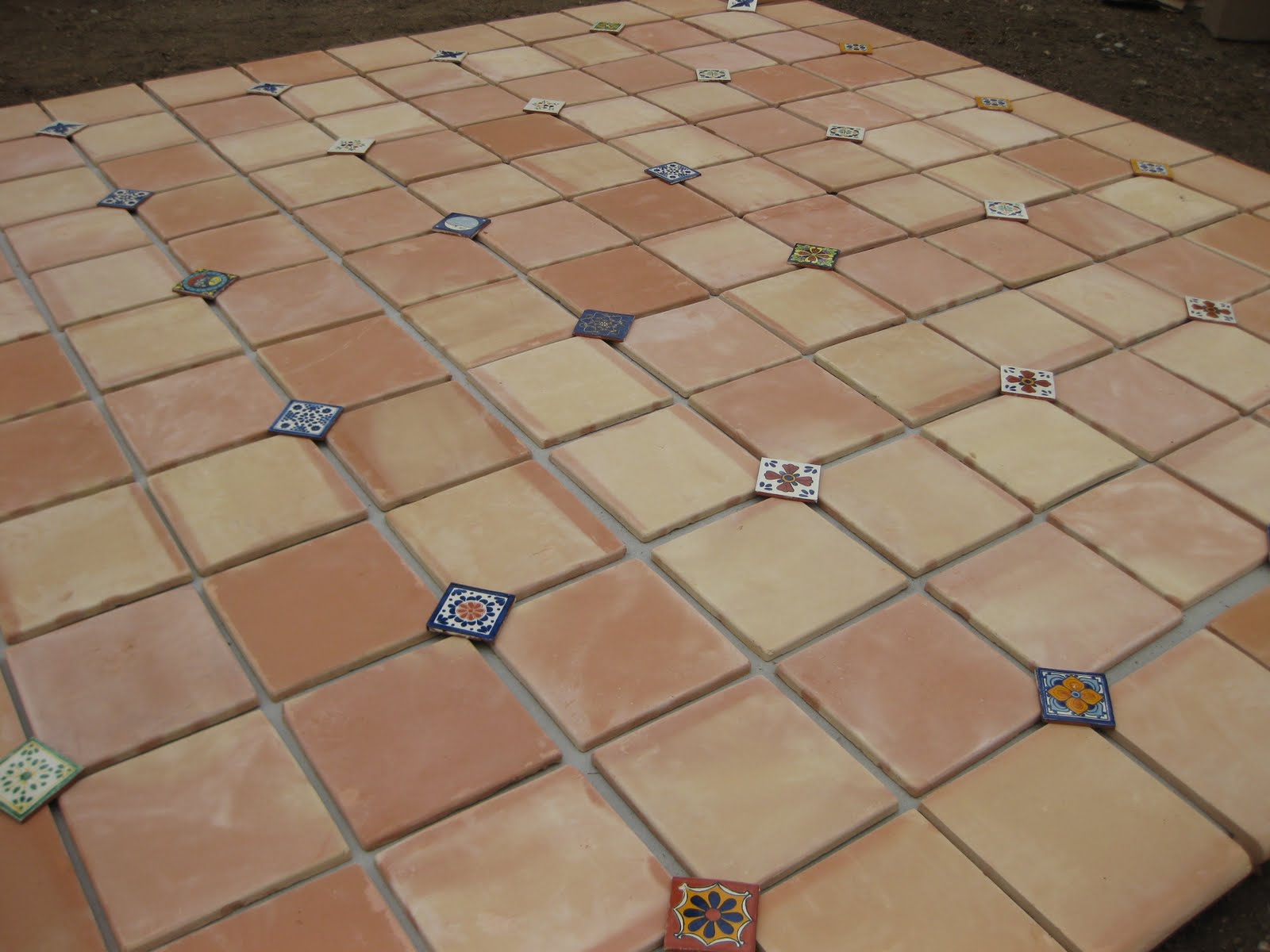 Pink Spanish Laying Out Patio Tile