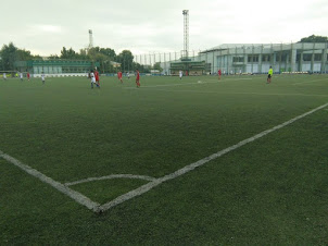 Youth playing soccer in Tashkent.