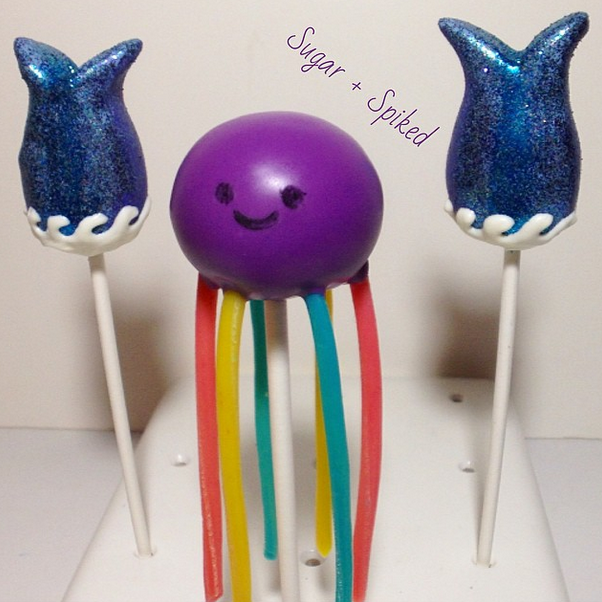 50 Cake Pop Collection for National Cake Pop Day 2015 32 An adorable octopus cake pop and mermaid tail pops from Sugar and Spiked