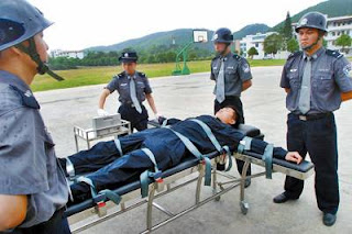 Chinese police officers rehearsing lethal injection procedures