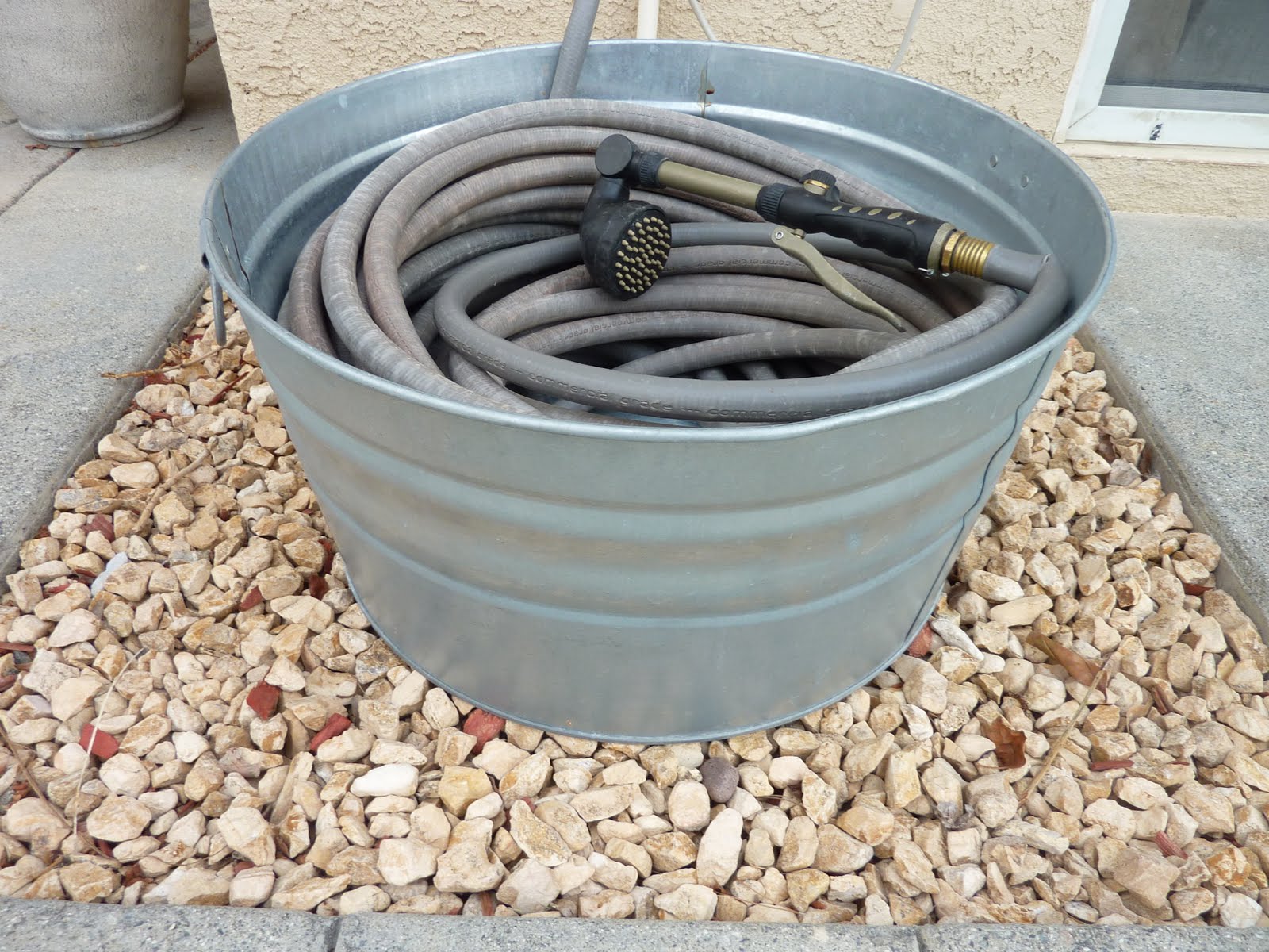 Addicted to Homes Unconventional Garden Hose Storage