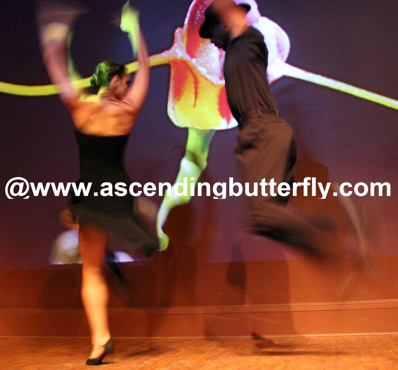 Ballet Hispanico BHdos, Dancer, Christopher Wilson, and his dance partner literally in mid air dancing the  Tango Vitrola - Tango Duet
