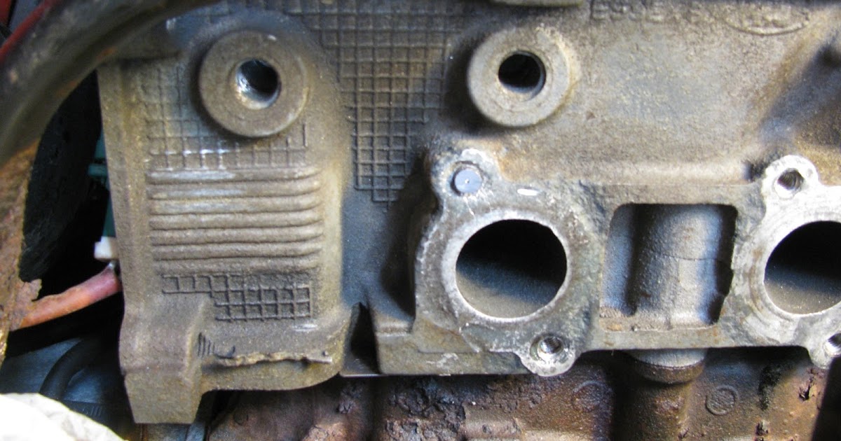 The Original Mechanic Drilling out and extracting a seized manifold