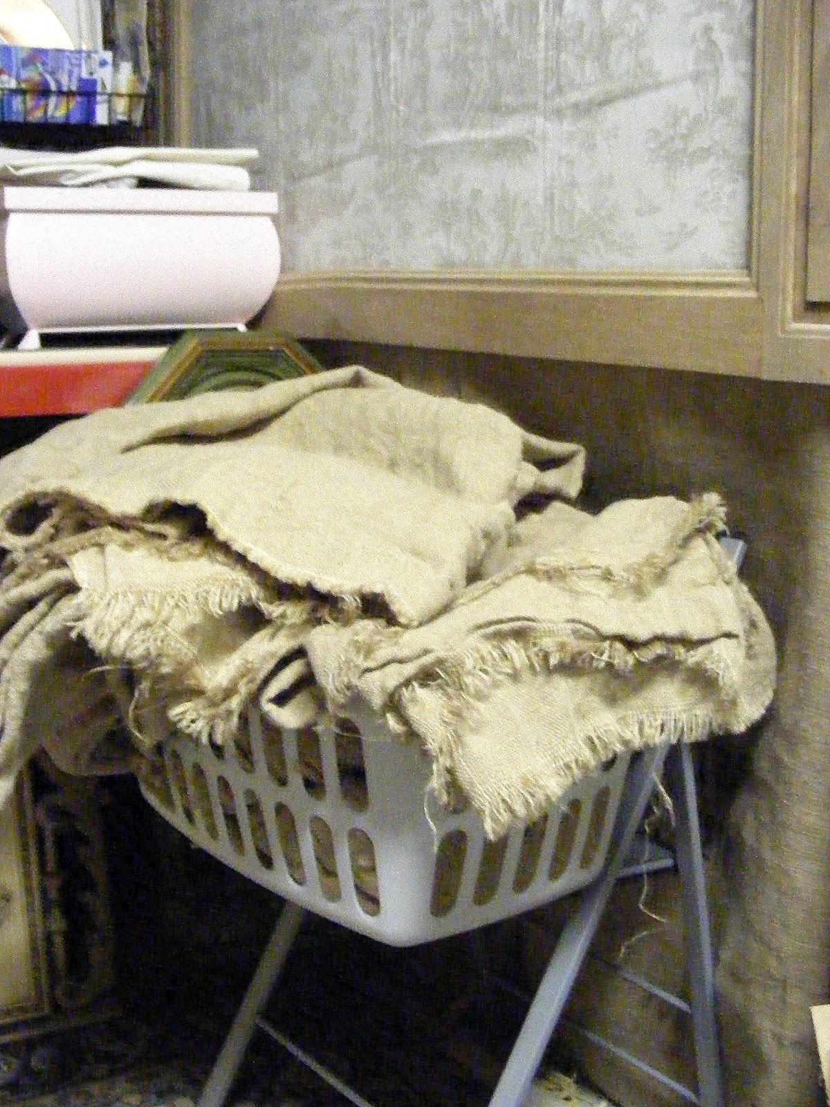 A Basket Full Of Washed Burlap & Treasures In Waiting Blue Creek Home