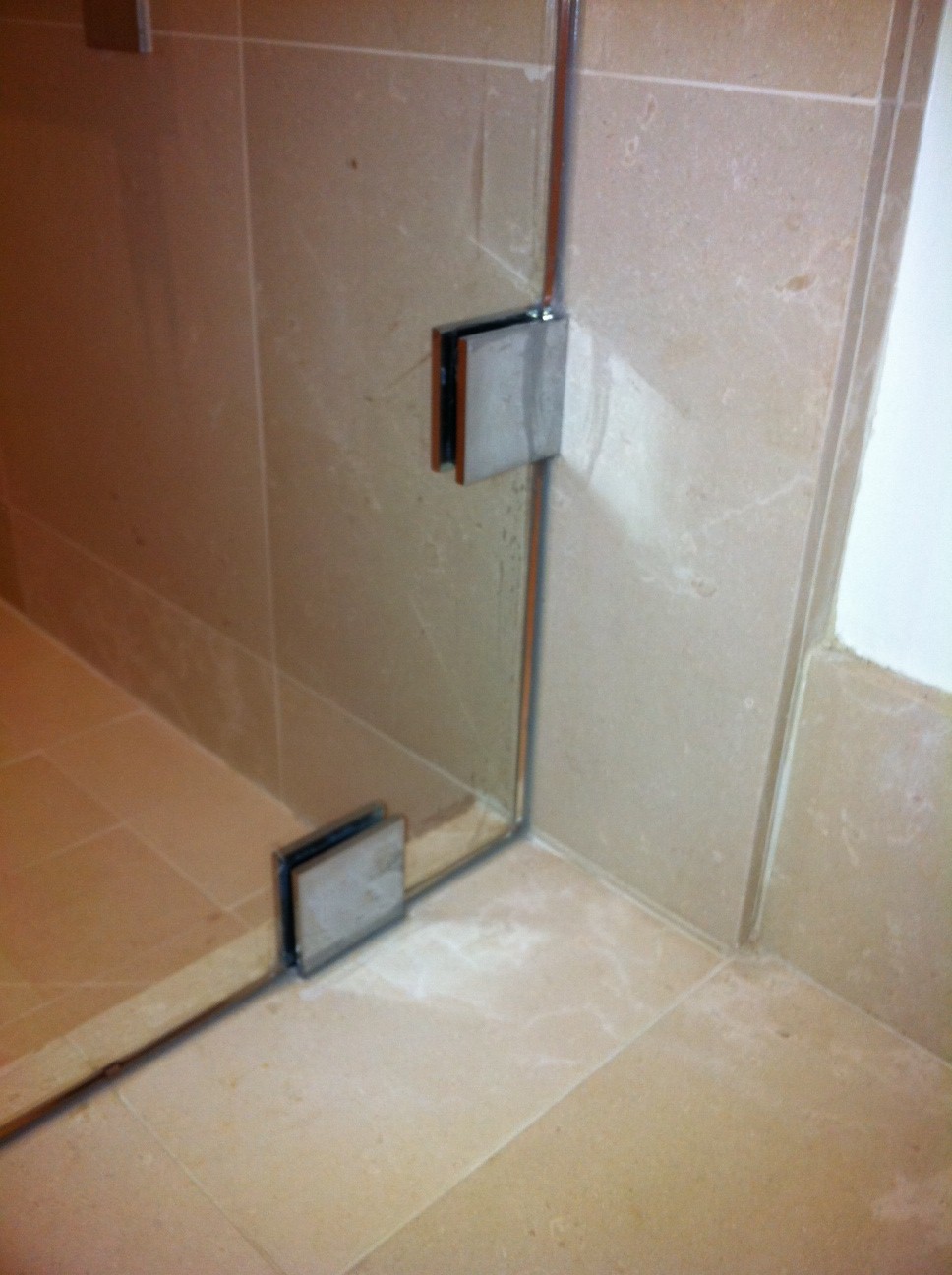 Frameless Shower Door With Cr Laurence Hardware Ot Glass The Shower Door Is Hung Off A Small Fixed Panel With Glass To Hinges Attached Using Clamps
