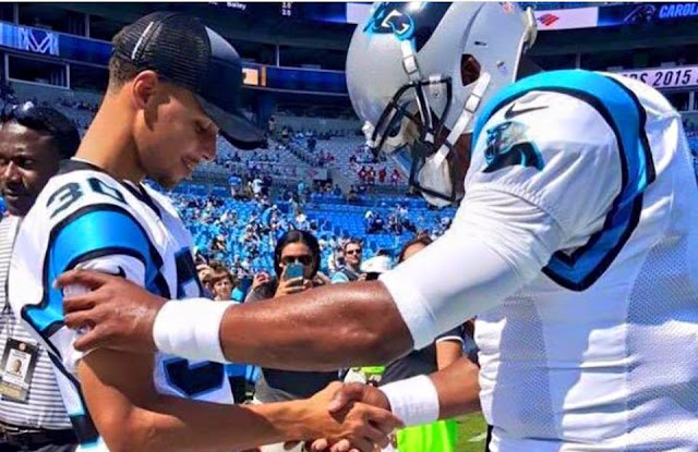 Praying. Stephen Curry & Cam Newton.