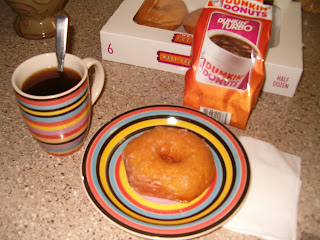 Breakfast coffee and doughnut