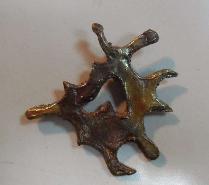 Colgante de bronce fundido a cera perdida