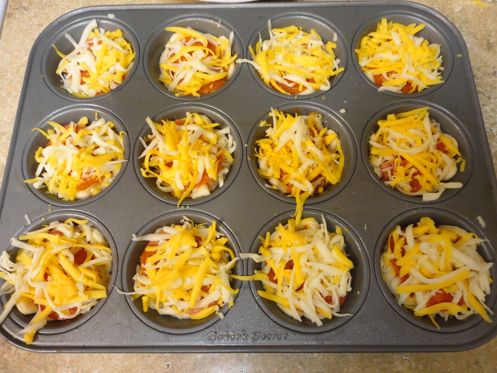 *Riches to Rags* by Dori Muffin Pan Pizza