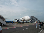 . luggage, weather was hot and humid. Then the conveyor belt started to . (cimg )