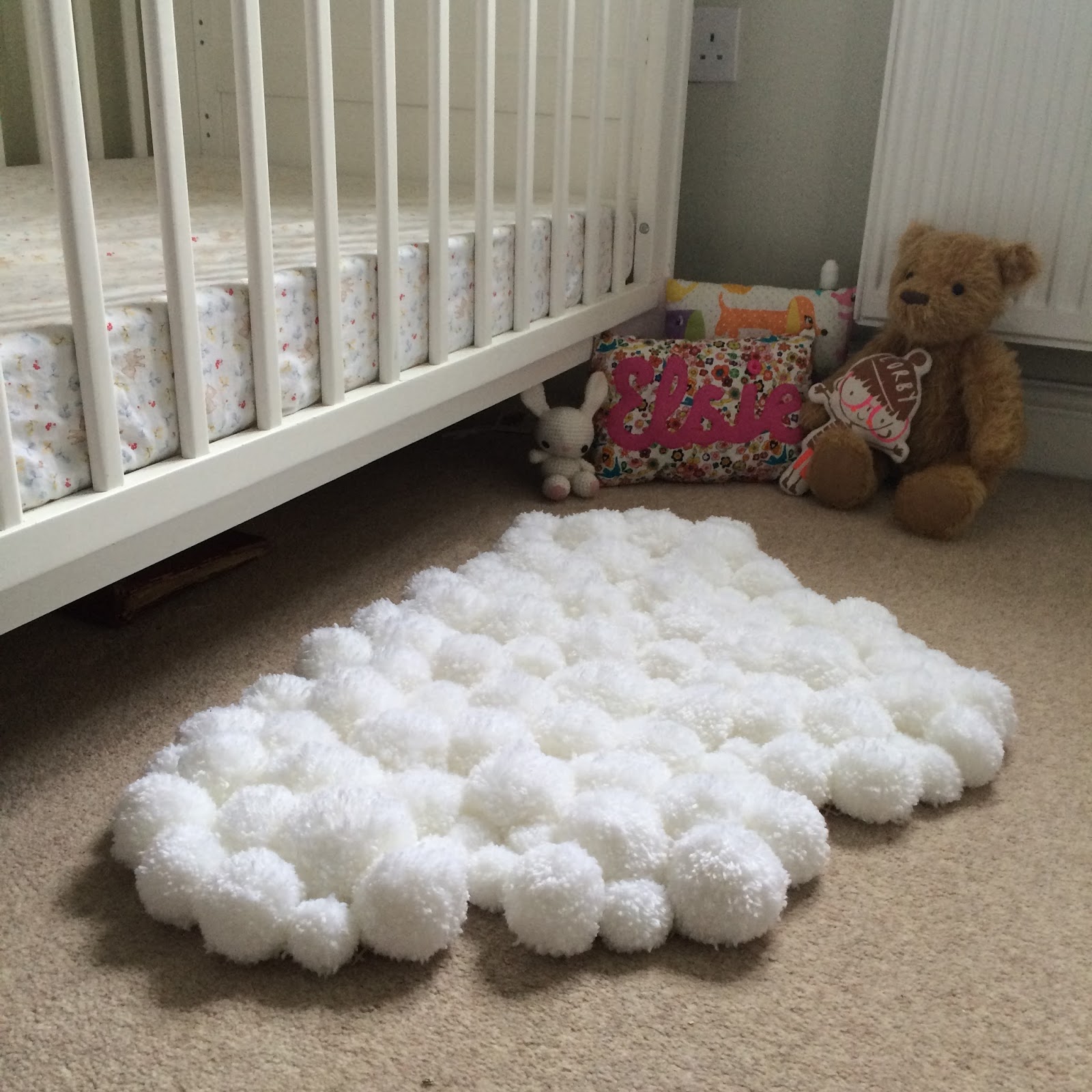 Winding the Bobbin Up PomPom Cloud Rug for Child's Bedroom DIY