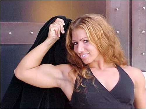 Bicep female wrestling with Girls Are
