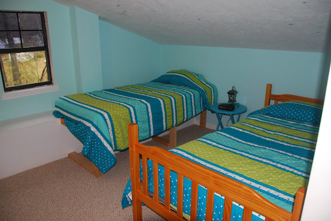 Loft bedroom with two twin beds