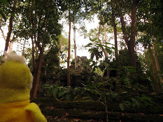 Swami contemplating Ta Keo, the cursed temple photo by asha