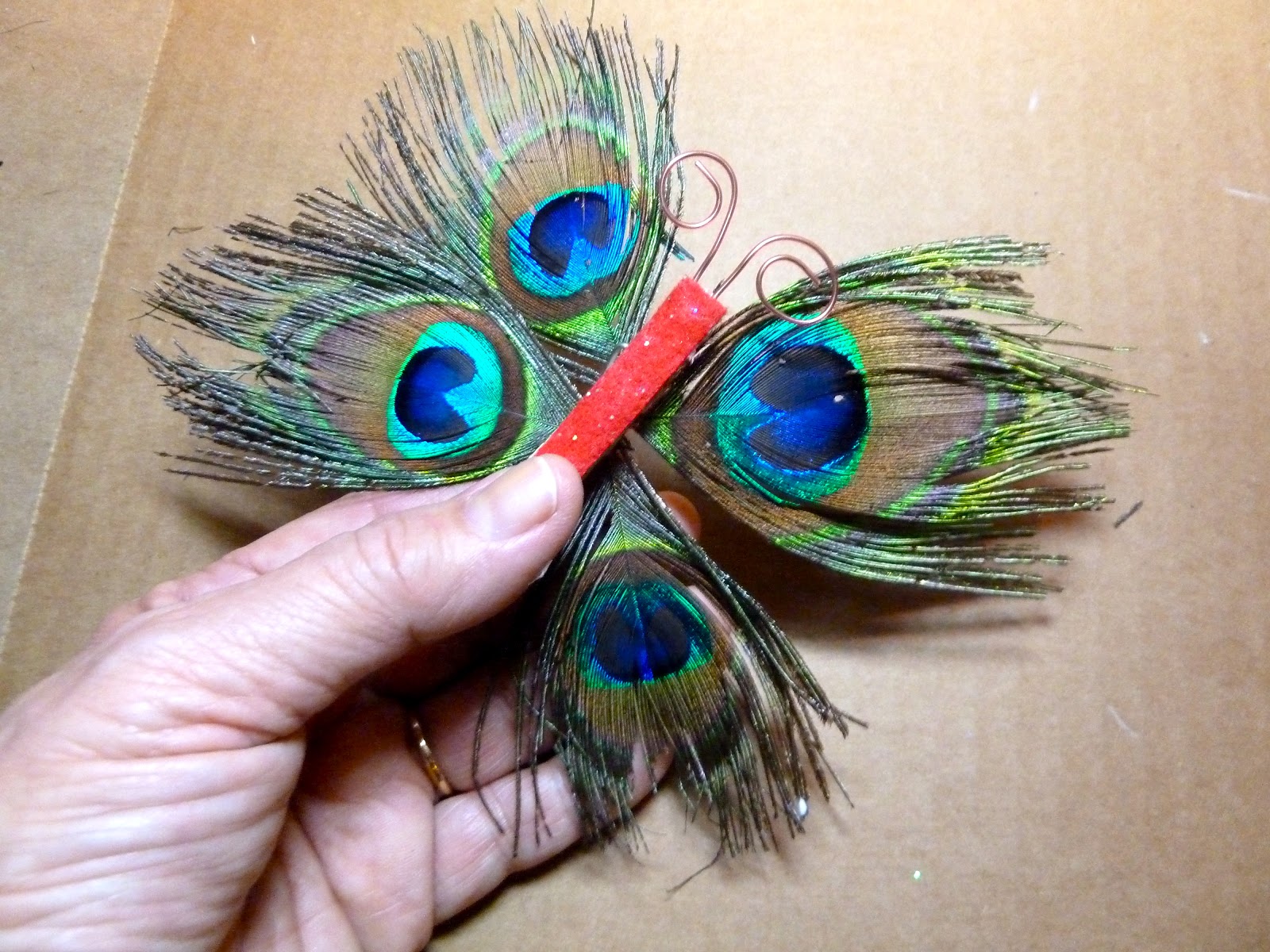 Make it easy crafts Peacock feather butterfly ornament