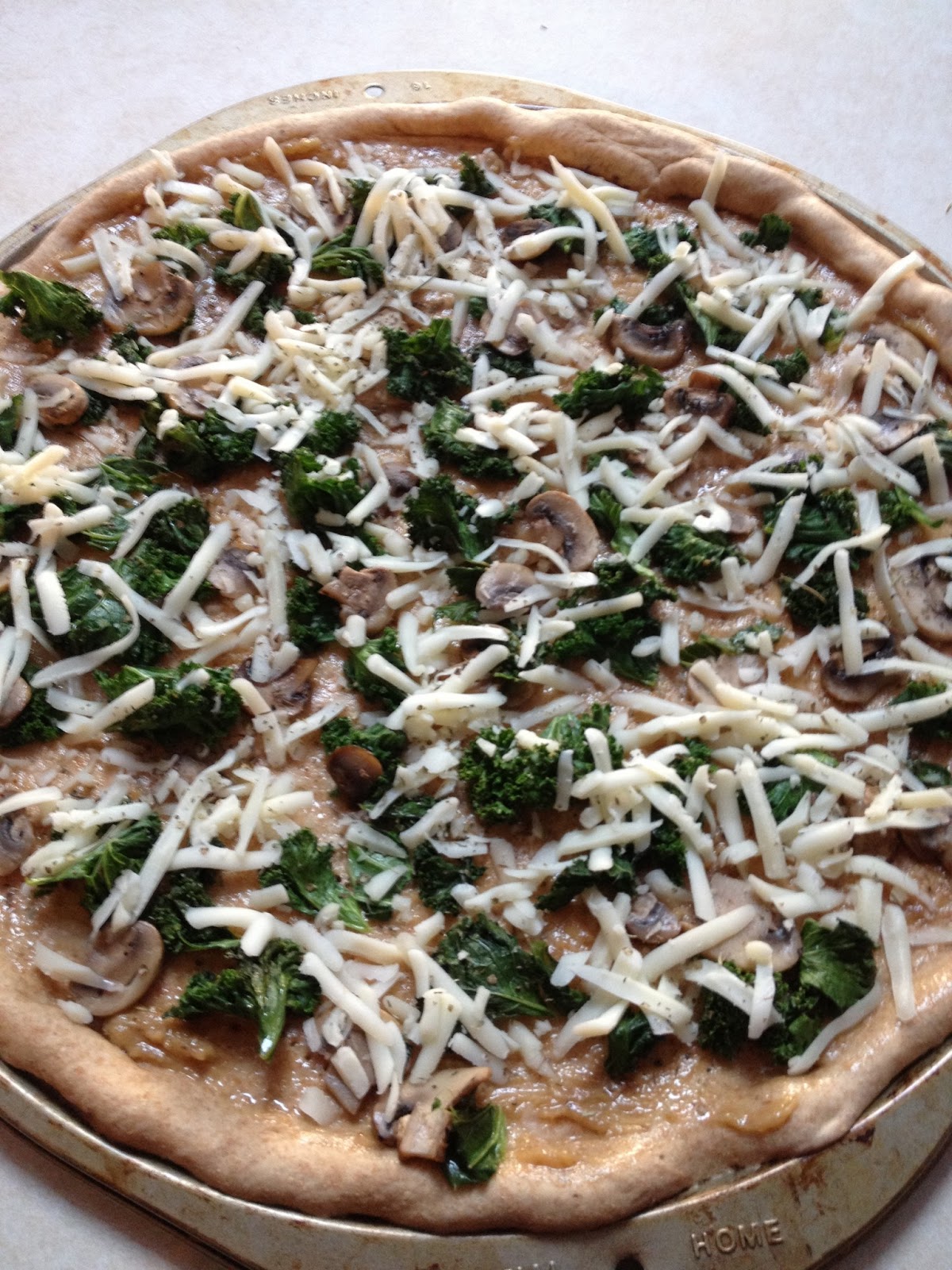 Water Lemon Kale Mushroom and Kale Pizza w/ Roasted Garlic Sauce