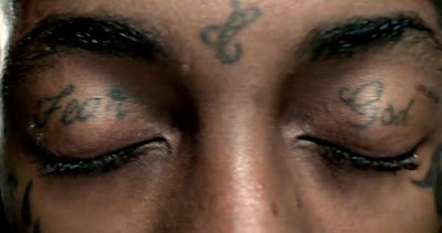 lil wayne tattoos on eye lids