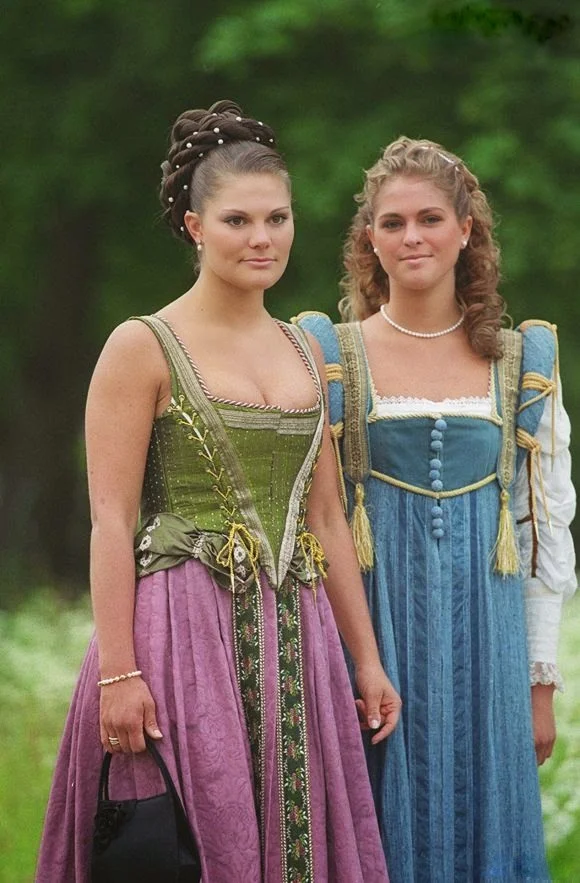 The Swedish princesses Victoria and Madeleine in medieval costumes in 2001 to 24 and 19 years.