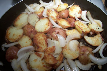 Pan of tators and onions.. yum