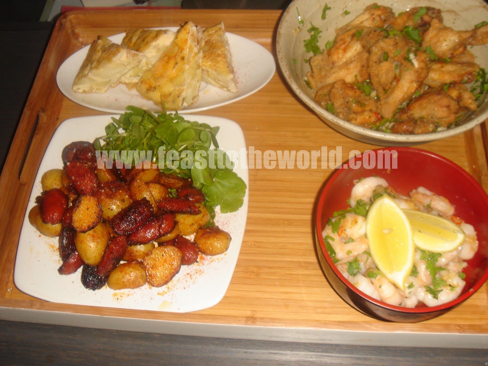 FEAST to the world New Year's Eve Spanish Tapas Chicken wings with