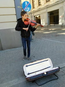 A Young Street musician in Riga Old Town.
