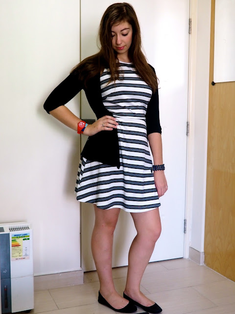 Simple Stripes | outfit of black & white striped skater dress with a black cardgian and black flat shoes for work