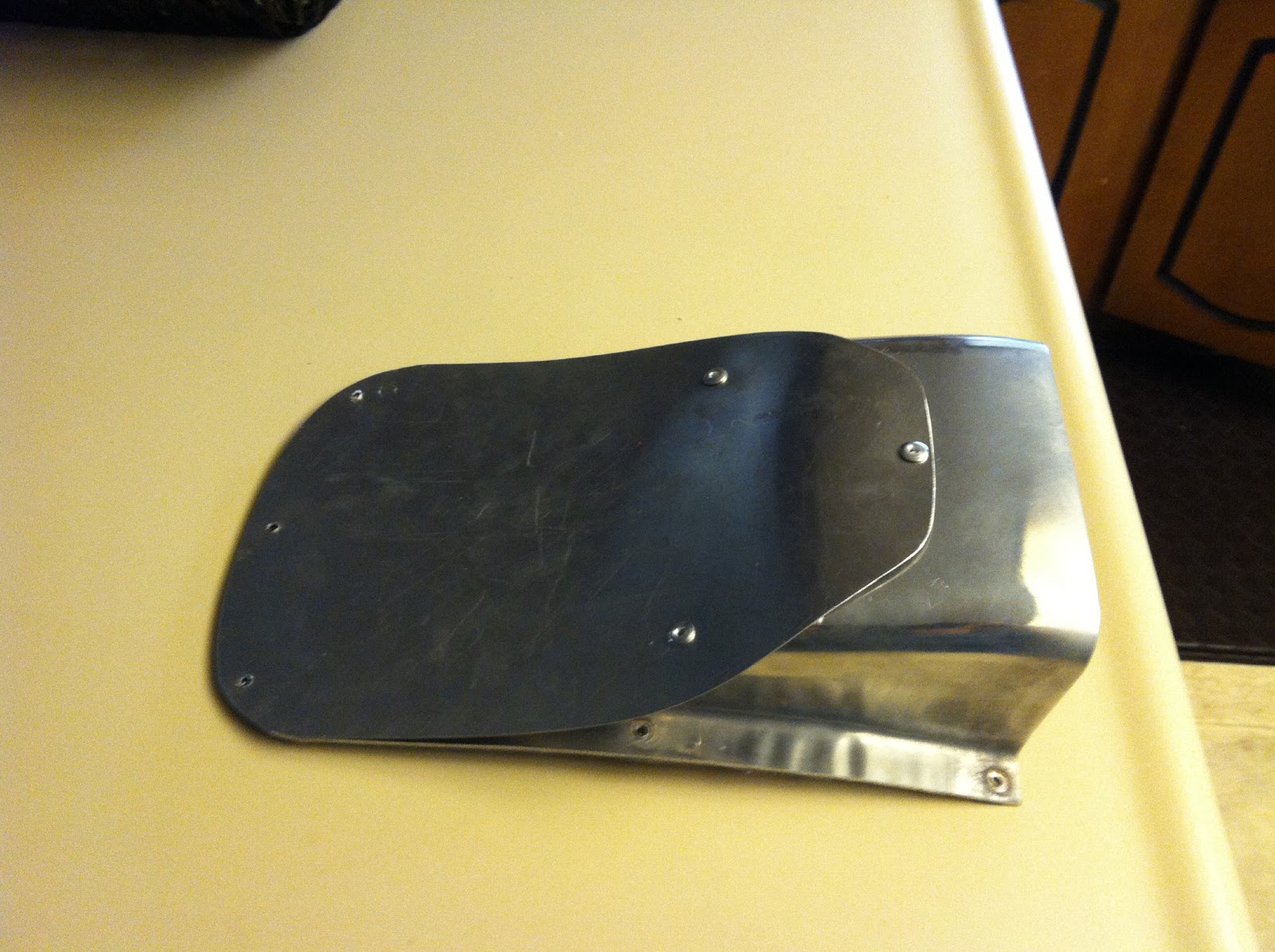 Airstream Renovation Airstream awning Installation with hood vent modification