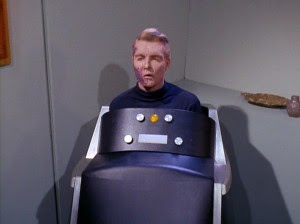 Star Trek's Captain Christopher Pike, in his body-covering wheelchair with electronics