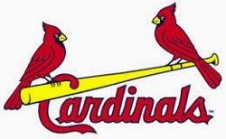 Two red-birds sitting on a baseball bat