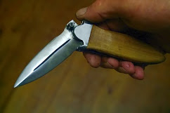 Double-edged folding Dagger