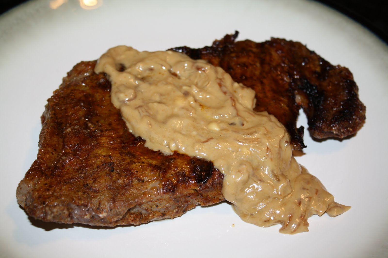 Seasoned with Love Grilled steak with a caramelized onion and