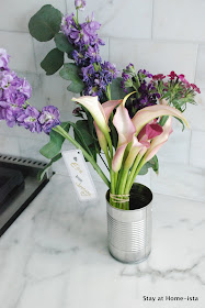 A quick and easy hostess gift or present, recuse a tin can as a vase.