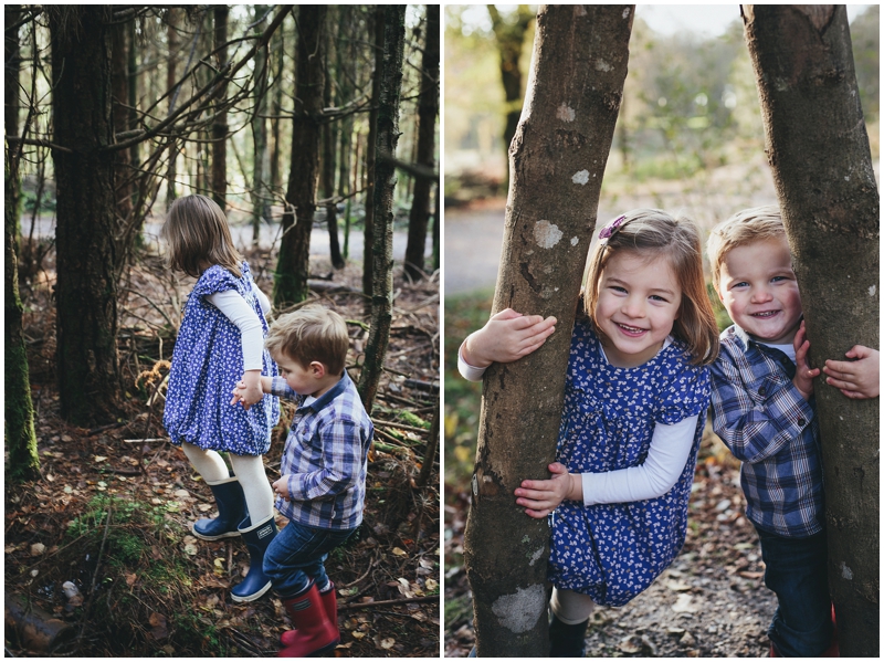 Relaxed family photos of two children exploring the trees and laughing