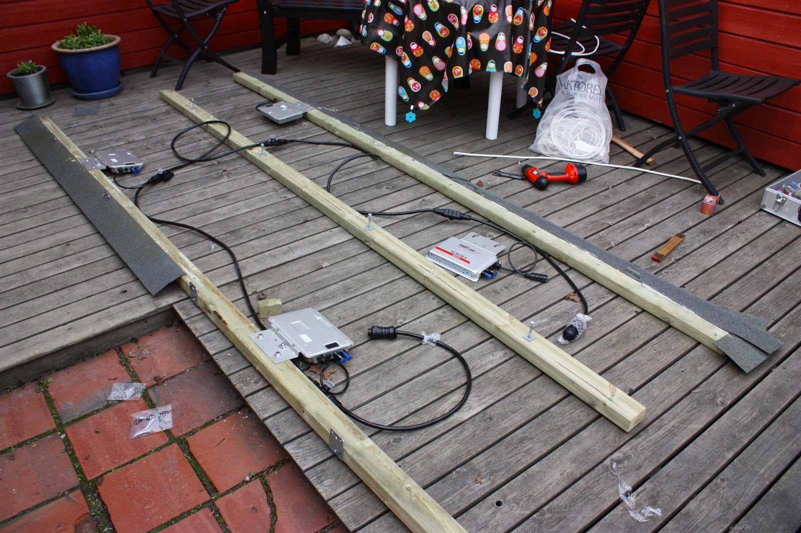 Planning is essentialbefore lifting onto the roof Showing planning the layout of the roof installation prior to lifting onto the roof