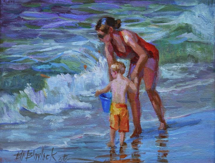 Mother and son in the surf.