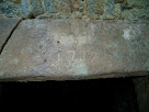 Llinda de la porta d'entrada al primer Molí del Pla, gravada amb la data de 1732 Llinda de la porta d'entrada al primer Molí del Pla, gravada amb la data de 1732