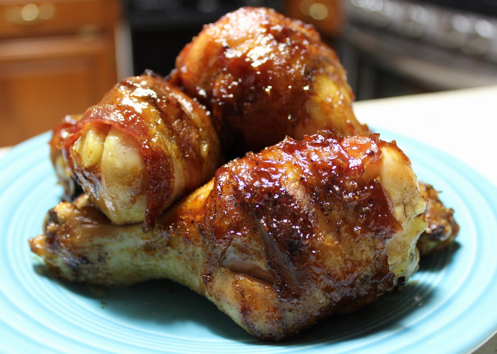 Bacon wrapped BBQ chicken legs.