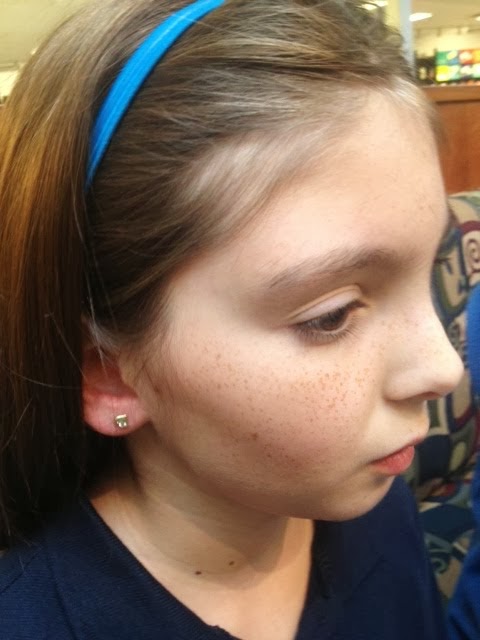 SOMEONE GOT HER EARS PIERCED...AGAIN