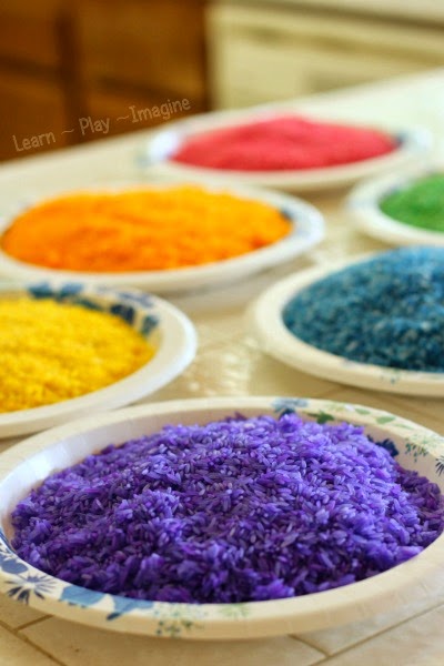Making rainbow rice - it's so easy to dye rice for sensory play, and it lasts forever!