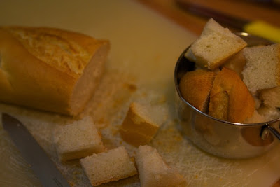 Bread cubes in measuring cup.