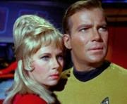 180px-James_Kirk_embraces_Janice_Rand.jp