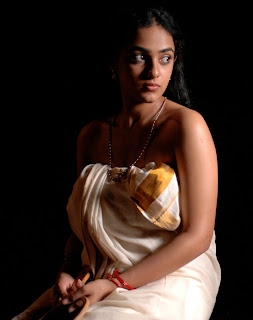 Nithya Menon sexy pictures from Urumi Malayalam movie